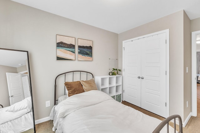743 Hadstock Path, Zebulon, NC 27597 - carpeted bedroom featuring a closet and baseboards