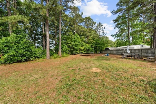 105 Little Rock Dr, Raeford, NC 28376 - view of yard featuring a trampoline