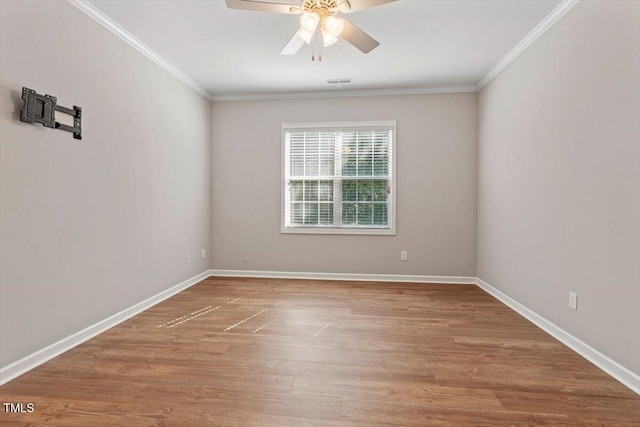 202 Verrazano Pl, Clayton, NC 27520 - unfurnished room with a ceiling fan, ornamental molding, wood finished floors, and baseboards