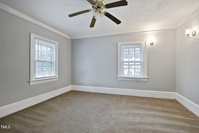 unfurnished room featuring baseboards, plenty of natural light, a ceiling fan, and carpet flooring