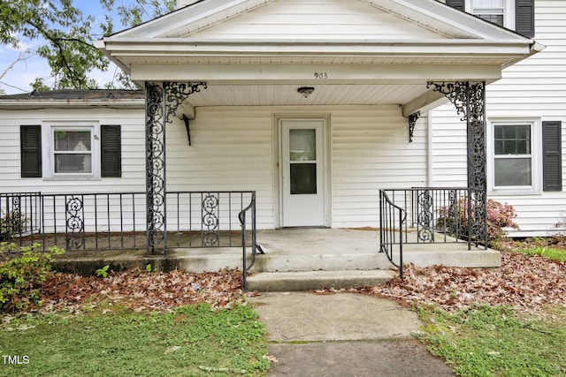 entrance to property with a porch