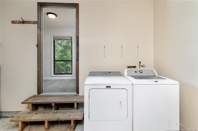 laundry room featuring washer and clothes dryer