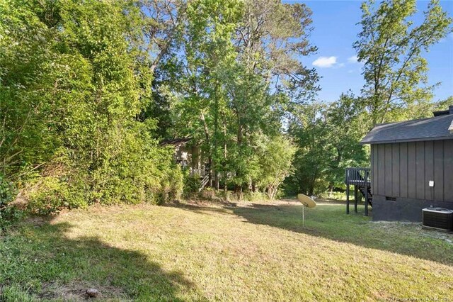 505 Toxaway Ct, Fayetteville, NC 28314 - view of green lawn featuring a deck and stairway