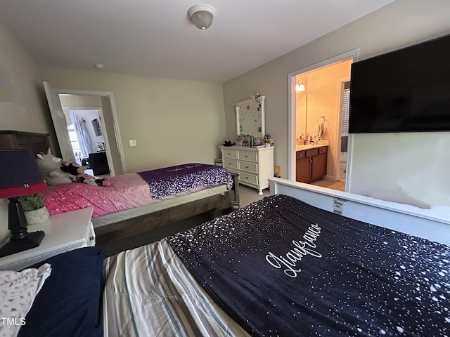 bedroom with connected bathroom