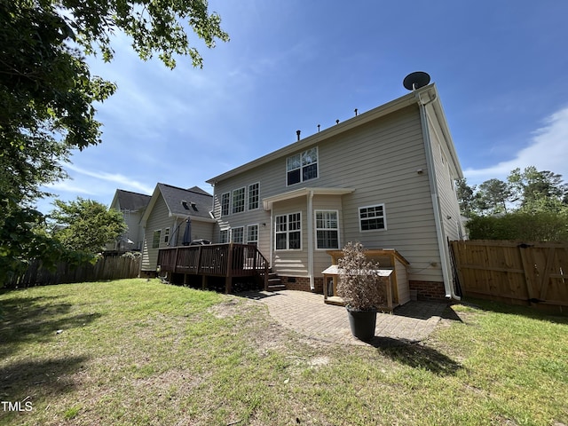back of house with a wooden deck