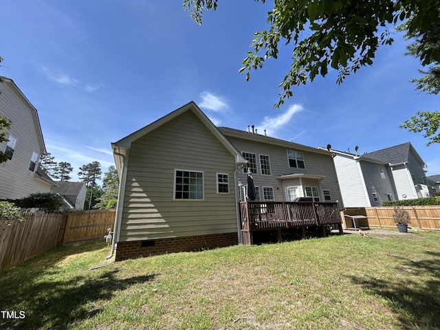 back of house featuring a wooden deck and crawl space