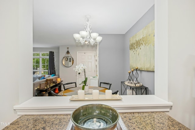 interior space with a chandelier