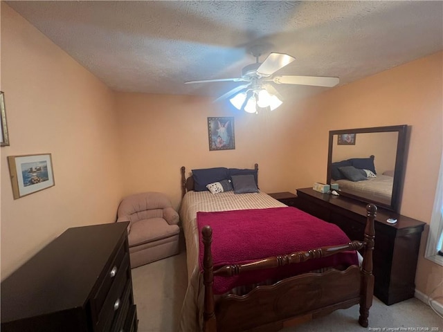3418 Rudland Ct, Fayetteville, NC 28304 - bedroom with light carpet, ceiling fan, and a textured ceiling