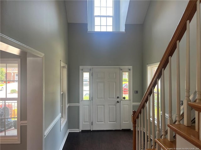 3418 Rudland Ct, Fayetteville, NC 28304 - entryway with a high ceiling, stairs, healthy amount of natural light, and dark wood-type flooring