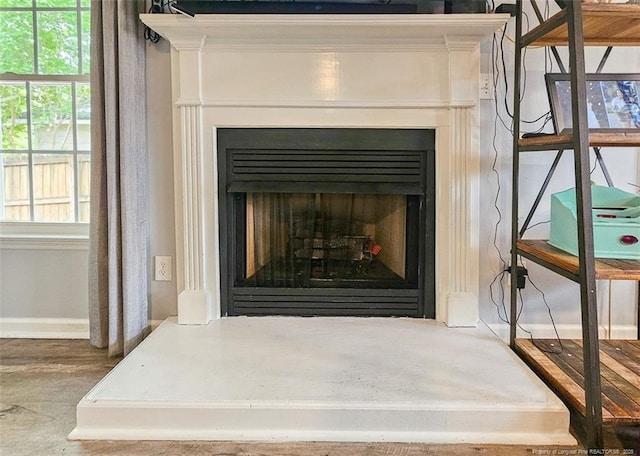 6314 Greycliff Dr, Fayetteville, NC 28314 - detailed view of a fireplace with raised hearth and baseboards