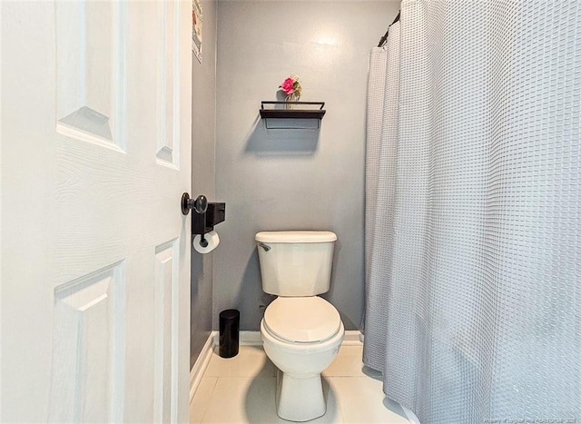 6314 Greycliff Dr, Fayetteville, NC 28314 - full bathroom featuring tile patterned flooring, toilet, baseboards, and curtained shower