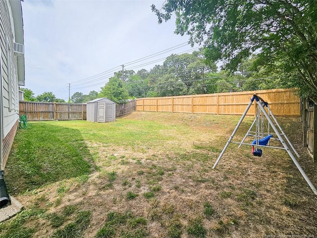 6314 Greycliff Dr, Fayetteville, NC 28314 - view of yard with a storage shed, a playground, and an outbuilding