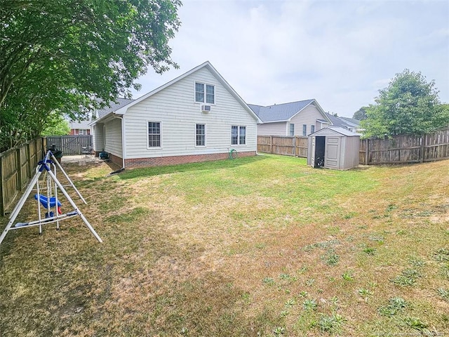 6314 Greycliff Dr, Fayetteville, NC 28314 - back of property featuring a storage shed, an outdoor structure, and a playground
