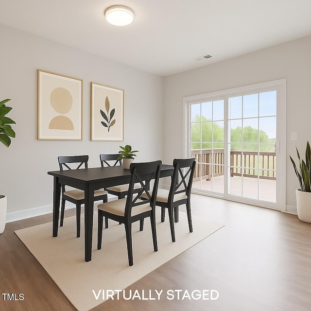 1073 Branch Line Ln, Apex, NC 27502 - dining space with wood finished floors and baseboards