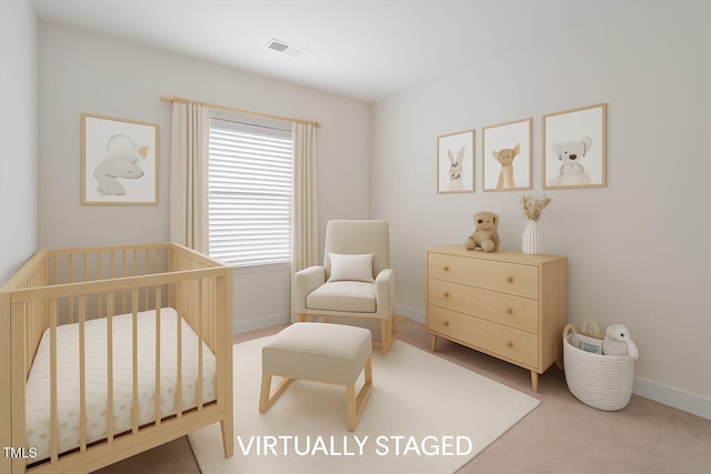 1073 Branch Line Ln, Apex, NC 27502 - bedroom featuring a crib, baseboards, and carpet floors