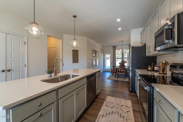LOT5 Cooper St, Sanford, NC 27330 - kitchen featuring a sink, stainless steel appliances, dark wood-type flooring, light countertops, and gray cabinetry