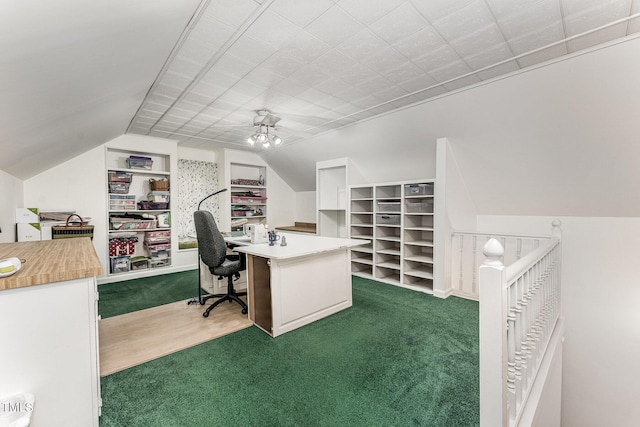 office featuring dark carpet and vaulted ceiling
