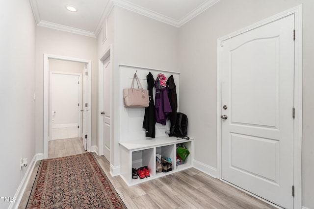 105 Forest Wood Dr, Salemburg, NC 28385 - mudroom with ornamental molding, light wood finished floors, and baseboards