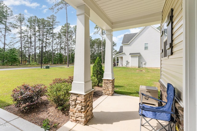 105 Forest Wood Dr, Salemburg, NC 28385 - view of patio with a porch