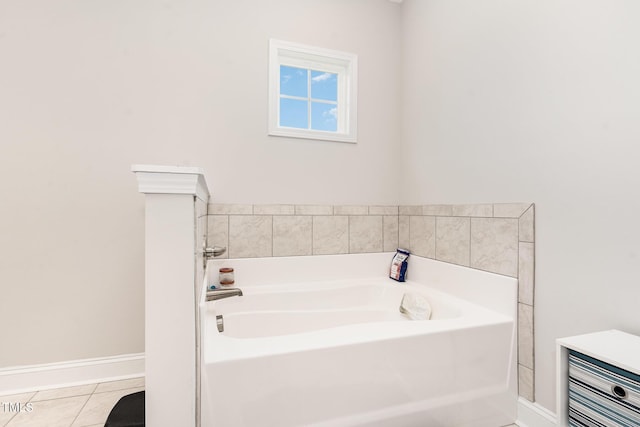 105 Forest Wood Dr, Salemburg, NC 28385 - bathroom with a garden tub, tile patterned flooring, and baseboards