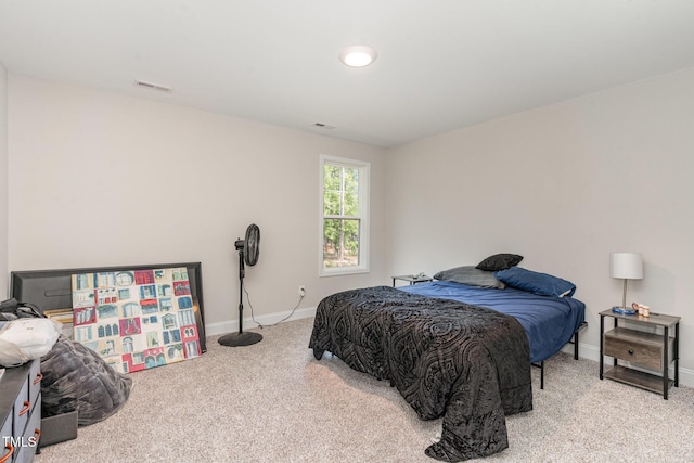 105 Forest Wood Dr, Salemburg, NC 28385 - bedroom featuring visible vents, carpet floors, and baseboards