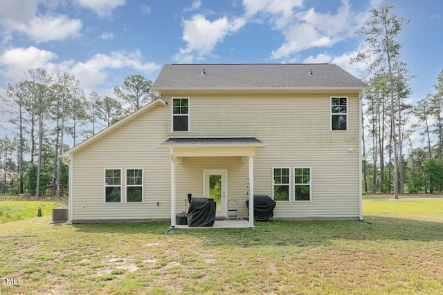 105 Forest Wood Dr, Salemburg, NC 28385 - rear view of property with a patio, cooling unit, and a yard