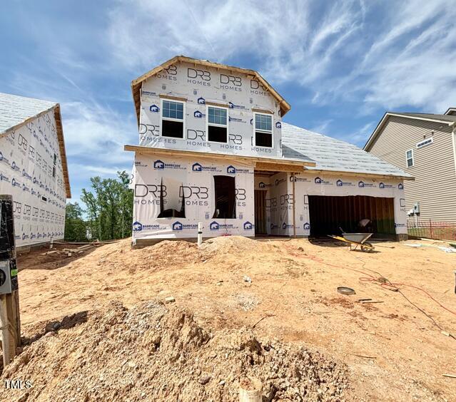 27 Spring Crest Dr Unit 69, Angier, NC 27501 - property in mid-construction featuring a garage