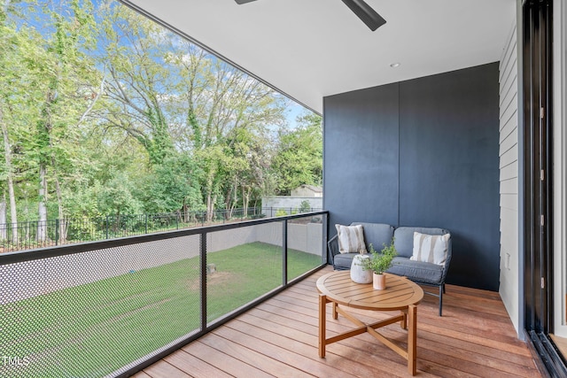 balcony featuring ceiling fan