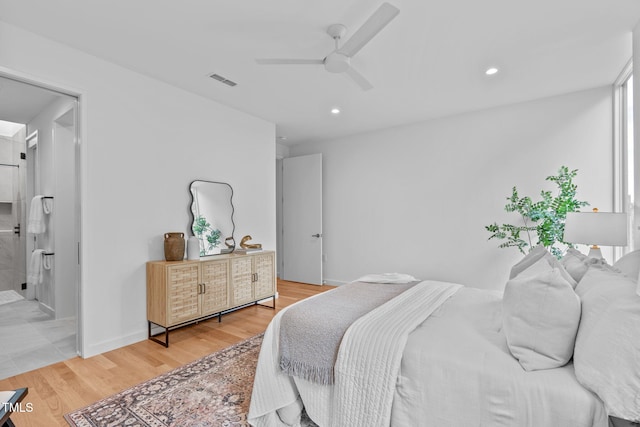 bedroom with visible vents, light wood-style floors, baseboards, recessed lighting, and a ceiling fan