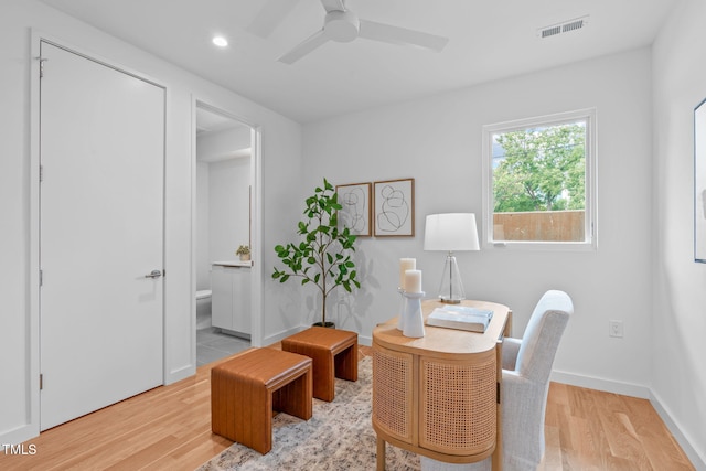 home office featuring recessed lighting, visible vents, a ceiling fan, baseboards, and light wood-style flooring