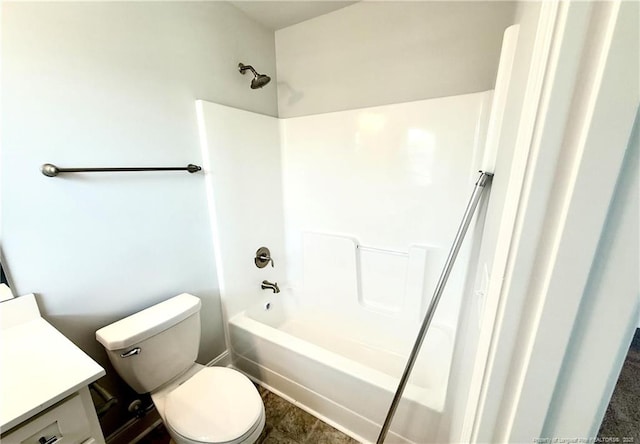 full bath featuring toilet, tub / shower combination, and vanity
