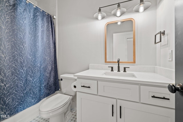 bathroom with vanity, tile patterned floors, a shower with curtain, and toilet