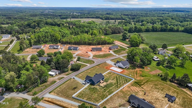 bird's eye view featuring a view of trees