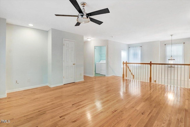 1480 Big Leaf Loop, Apex, NC 27502 - unfurnished room featuring a ceiling fan, washer / clothes dryer, light wood-style flooring, baseboards, and recessed lighting