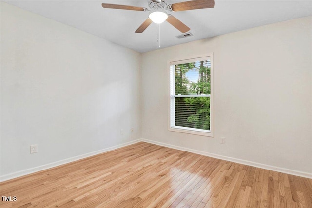 1480 Big Leaf Loop, Apex, NC 27502 - unfurnished room with light wood-style flooring, baseboards, and ceiling fan