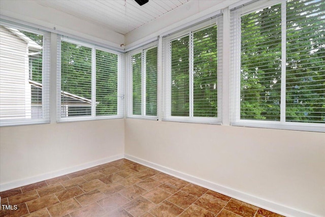 1480 Big Leaf Loop, Apex, NC 27502 - unfurnished sunroom featuring baseboards