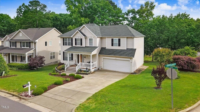 1480 Big Leaf Loop, Apex, NC 27502 - traditional home featuring an attached garage, covered porch, driveway, and a front lawn