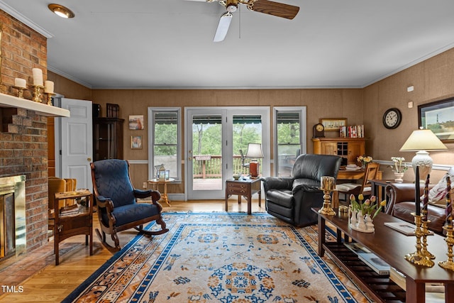 113 Denard St, Oxford, NC 27565 - living area featuring crown molding, light wood finished floors, a ceiling fan, and plenty of natural light