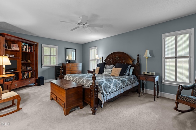 113 Denard St, Oxford, NC 27565 - bedroom featuring a ceiling fan, light colored carpet, and baseboards