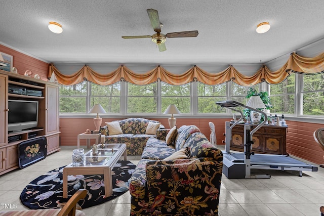 113 Denard St, Oxford, NC 27565 - living room with a ceiling fan, light tile patterned floors, a healthy amount of sunlight, and a textured ceiling