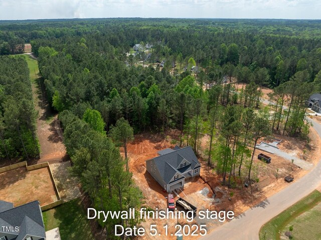 bird's eye view with a forest view