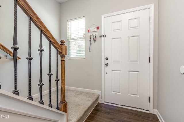 420 Cherry St, Fuquay Varina, NC 27526 - entryway featuring baseboards, stairway, and dark wood-type flooring