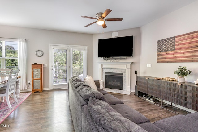 420 Cherry St, Fuquay Varina, NC 27526 - living area with plenty of natural light, ceiling fan, wood finished floors, and a premium fireplace