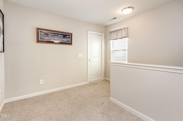 420 Cherry St, Fuquay Varina, NC 27526 - empty room featuring baseboards, visible vents, and light colored carpet