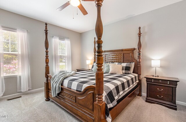 420 Cherry St, Fuquay Varina, NC 27526 - bedroom with baseboards, light carpet, and visible vents