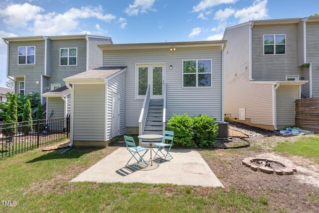 420 Cherry St, Fuquay Varina, NC 27526 - back of property with fence, cooling unit, a patio area, an outdoor fire pit, and a yard