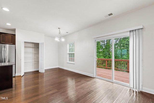 1101 Boxcar Way, Apex, NC 27502 - unfurnished dining area featuring a chandelier, dark wood-style floors, baseboards, and recessed lighting