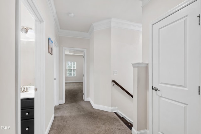 1101 Boxcar Way, Apex, NC 27502 - hallway with an upstairs landing, carpet floors, crown molding, and baseboards
