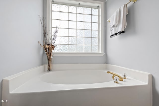 full bath with a garden tub