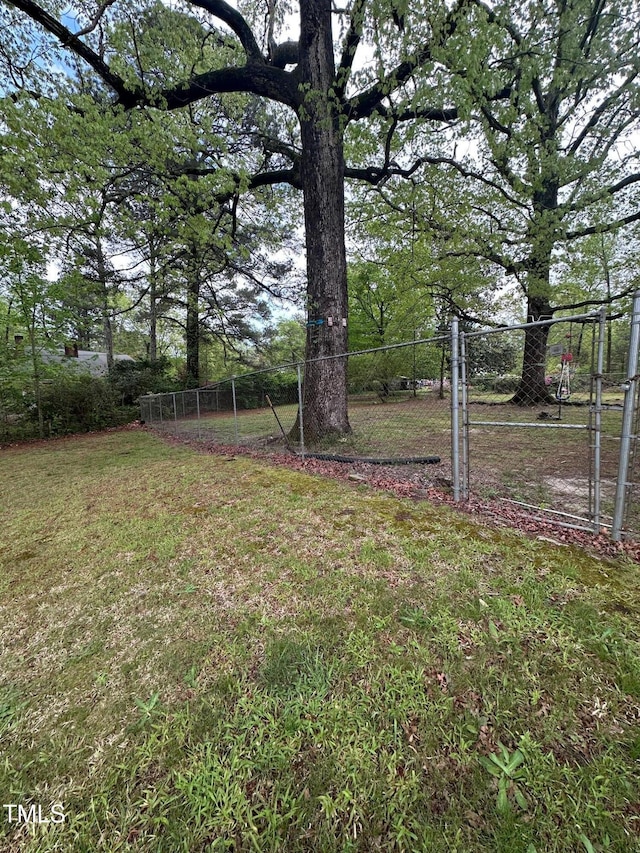 view of yard featuring fence